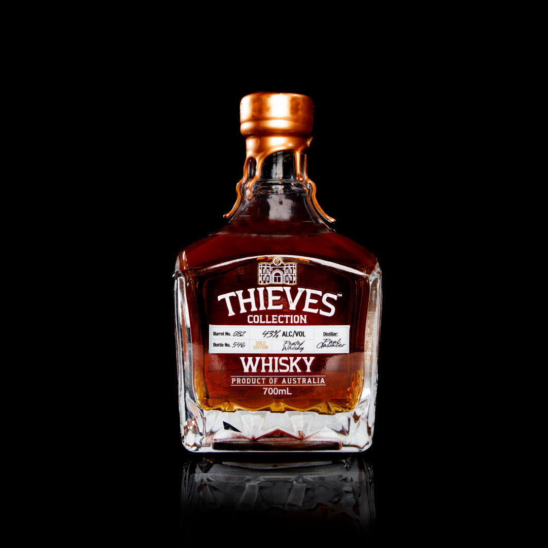 Front view of Whisky Gold bottle from Thieves Collection with detailed labeling